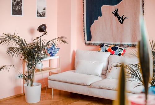 A fun pink painted room with a unique floor design - painting service provided by Painter1.