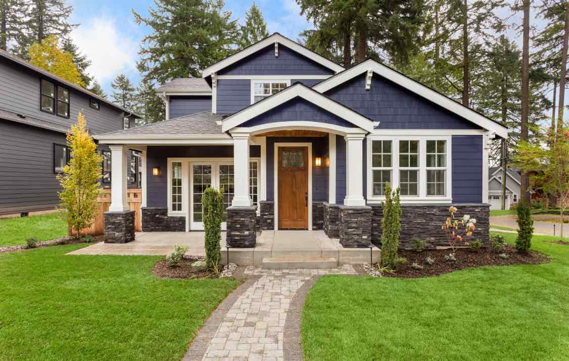 This dark blue home exudes sophistication thanks to a paint job from Painter1 of Salt Lake City Sandy.