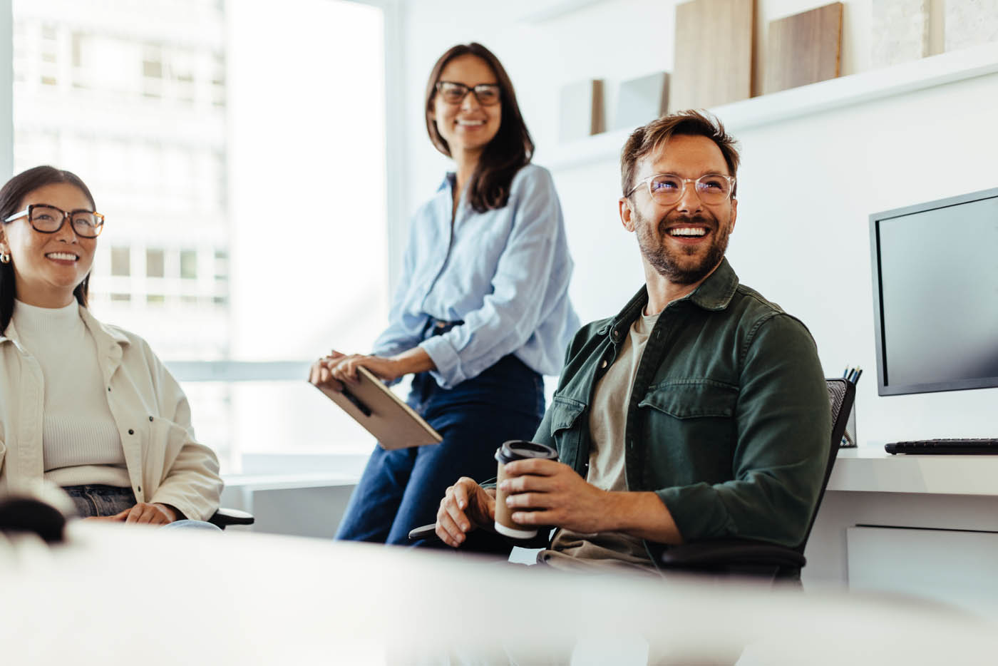 a group of people in their office.