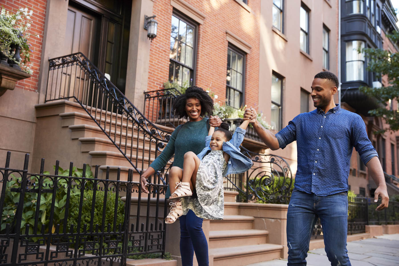 An image of a family walking down a city street - Rest Easy offers expert pest control services to protect your home or business.