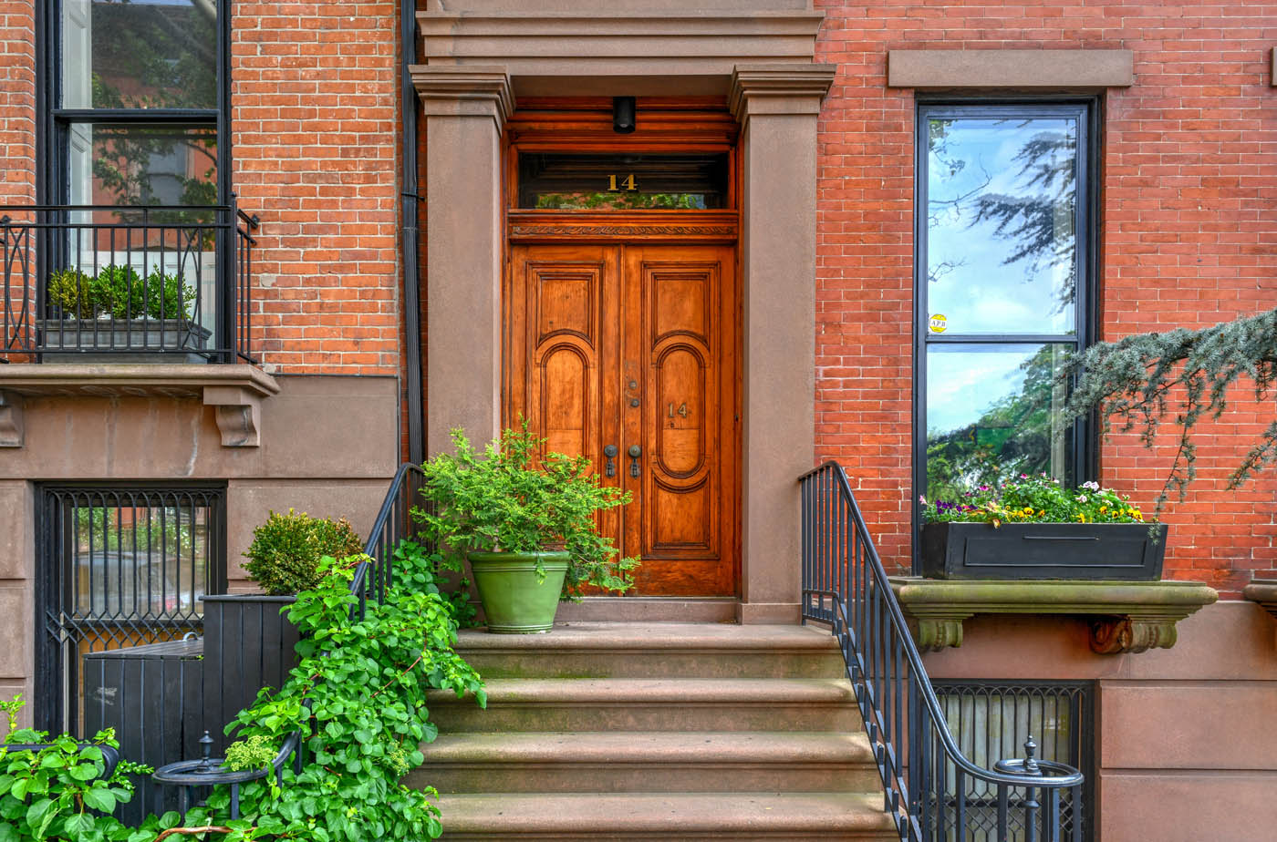 The front door of a home in a city - Rest Easy Pest Control offers expert roach exterminator services.